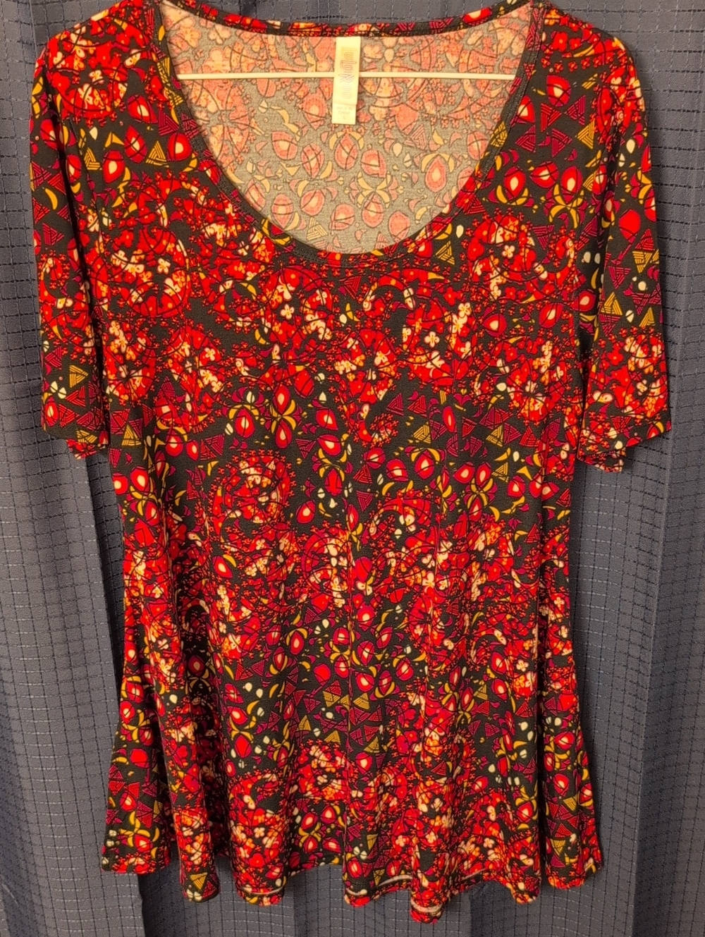 LuLaRoe Scoop Neck Floral Tee in Peach, red, and Yellow